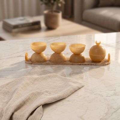 Set of 4 yellow serving bowls set on tray with gift box