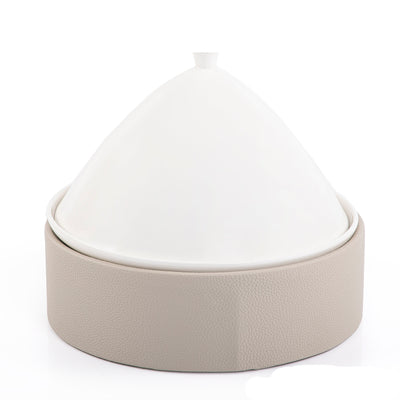 Ceramic plate with leather base