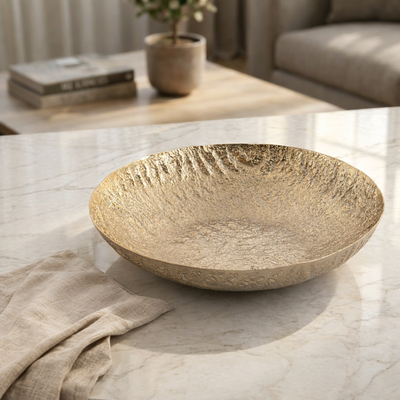 Golden round metal bowl