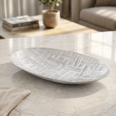 Silver oval metal plate